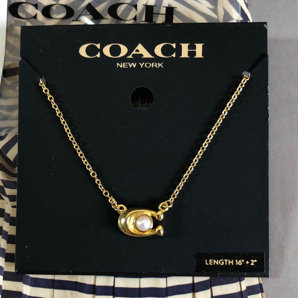 Authentic New with tag Coach Gold-tone C Pendant Necklace with Pearl Accent.